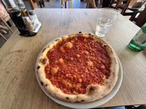 Pizza without cheese ( 8.50 euros ) at Pizzeria Jupiter in Pula