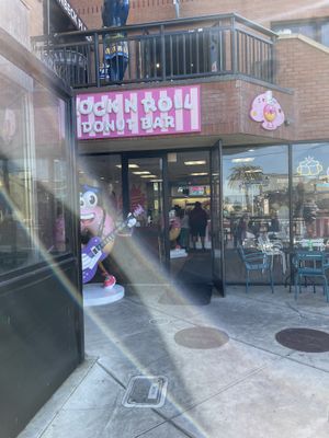 Outside. Located at Steinbeck plaza where the old Johnny rockets used to be    at Rock N Roll Donut Bar in Monterey