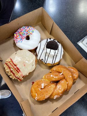Vanilla, Oreo, plain glazed and pb&j  at Rock N Roll Donut Bar in Monterey