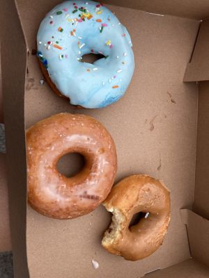 Maple, glazed, and (blue) frosted vanilla with sprinkles   at Rock N Roll Donut Bar in Monterey