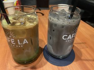 Sesame latte and dirty matcha latte both with soy milk  at Cafe LA in Osaka