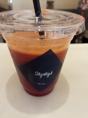 They don't fill the cup to the top - "Blood" juice at Sky High - Shinjuku in Tokyo