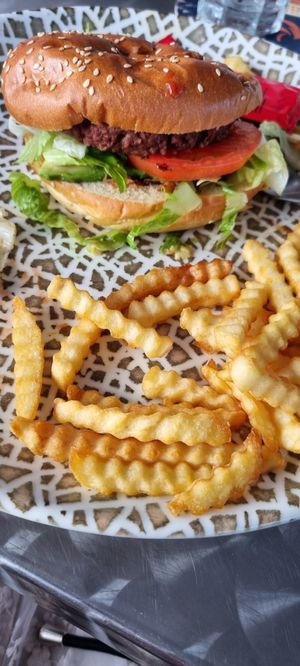 Vegetarian Burger (vegan) with fries at Sapori in Mallorca