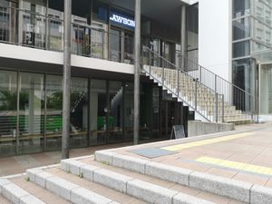 The entrance is under those stairs. Located next to the mos burger. at Garden Kitchen in Fukuoka