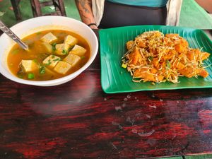 fermented cabbage and tofu in tomato soup and chickpea tofu at Pa Yod Shan Vegetarian Cafe in Chiang Mai