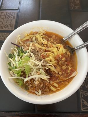 Rice noodles with ‘pork’ in curry soup  at Pa Yod Shan Vegetarian Cafe in Chiang Mai