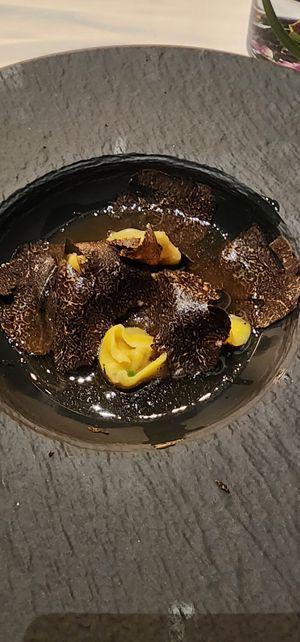 Black truffle tortellini from the tasting menu. The chef comes out and chats with you as they shave the truffles onto your plate. at Crossroads Kitchen in Las Vegas