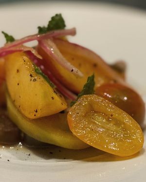 HEIRLOOM TOMATO & PEACH SALAD (GF)  at Crossroads Kitchen in Las Vegas