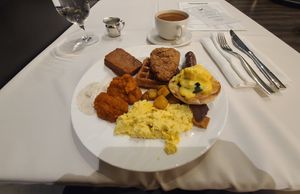 Eggs florentine, scrambled eggs, breakfast potatoes, chik'n and waffles, Buffalo bites with bleu cheese (!), potatoes rosti at Crossroads Kitchen in Las Vegas