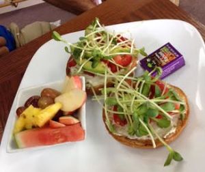 breakfast bagel with cashew cream cheese, sprouts & tomatoes at Food For Thought Cafe in Marathon