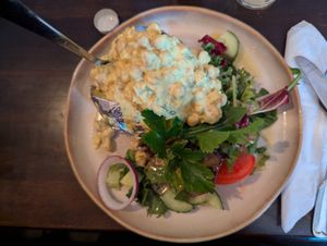 Baked potato with chickpea curry at  Verte in Stockholm