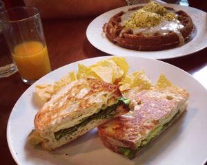 Veggie grilled cheese and the Feast waffle with gravy and tofu scramble at A N D Cafe in Portland