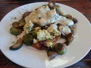 Lunch special (I forgot the name).  English muffin topped with caramelized Brussels sprouts and tofu. at A N D Cafe in Portland