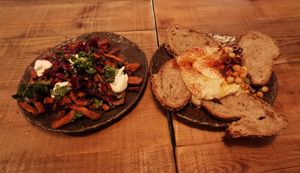 Sweet potato fries with beet ketchup and vegan aioli (left) and hummus (right) to share at Honest Greens in Porto