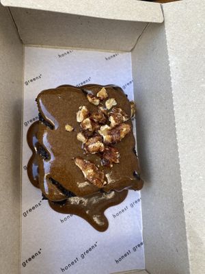 Cauliflower brownie   at Honest Greens in Porto