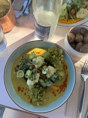 Vegan lentil curry and side of roasted baby potatoes  at DRY Restaurant & Cocktail Bar in Villefranche-sur-mer