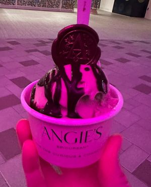 Pistachio, one scoop w/ chocolate hazelnut drizzle  at Angie's Epicurean in West Palm Beach