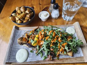 vegan mushroom flatbead with deep-fried mini potatoes and vegan mayo😁 at Salka in Husavik