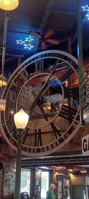 Huge clock  at Portillo's in Forest Park