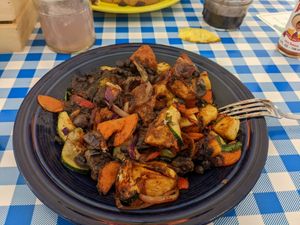 The Ocean Vista Hash, with potatoes, sweet potatoes, and veggies. This photo shows it with a side of black beans on top. at Osprey Café in Seaside