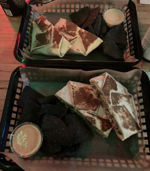 Potato crunchwraps with regular and blanco queso 🤤  at JDs VegMex in Miami