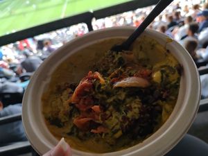 Yummy curry topped with jackfruit and onions at Cooka T's Vegan Stand in Seattle