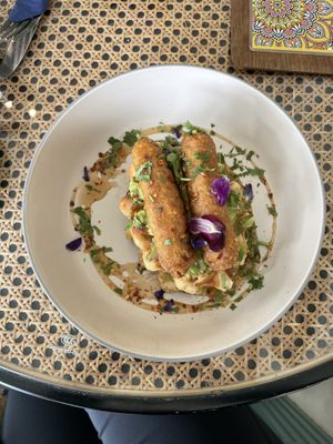 Delicious vegan waffles with avocado, sausages, chilli and maple syrup. Never had that combo before!  at The Chakra Lounge in Bakewell