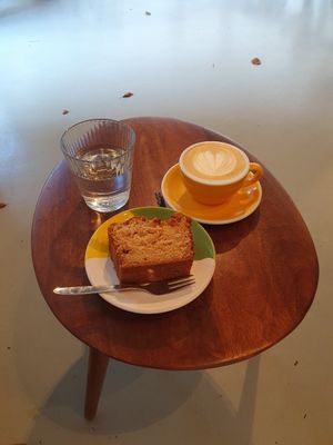 Apple cake, cappuccino with oatmilk, free water to drink at Intense Coffee in Luxembourg City