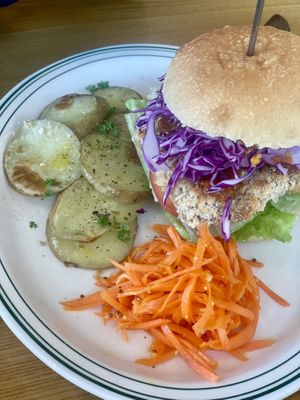 Burger with potato slices & carrot salad. Yum!  at Five Seventh - 칠분의 오  in Jeju