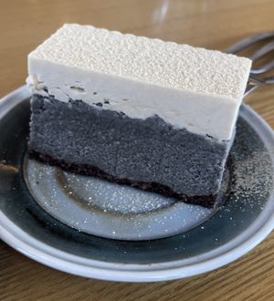 The side view of black sesame & cream cake looks like an art. It is also tasty!   at Five Seventh - 칠분의 오  in Jeju