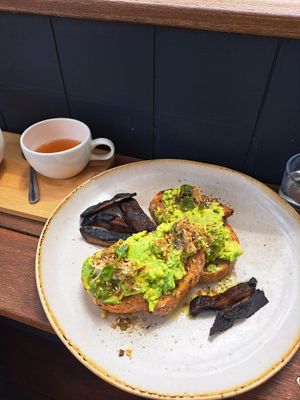 Avo toast with added mushrooms at For Change in Middle Park