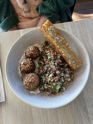 Falafel bowl with added potato rosti  at For Change in Middle Park