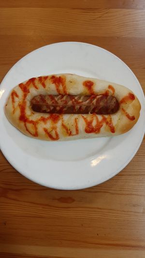 Pastry with vegan sausage at Loving Hut - Tsagaan Khaalga in Ulaanbaatar