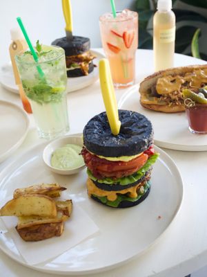 Chef's Burger with double patty, fresh veggies, homemade pesto, special aioli sauce and rustic potato wedges at We Cafe - Maybe closed in Cape Town