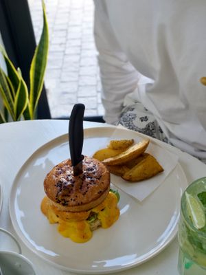 Double Cheese Burger. Homemade brioshe bun, special patty, fresh veggies and rustic potato wedges at We Cafe - Maybe closed in Cape Town