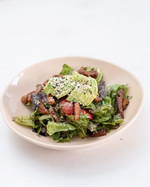 Green salad. Lettuce mix with homemade basil pesto, cherry tomatoes, fresh avocado and tempeh bacon  at We Cafe - Maybe closed in Cape Town
