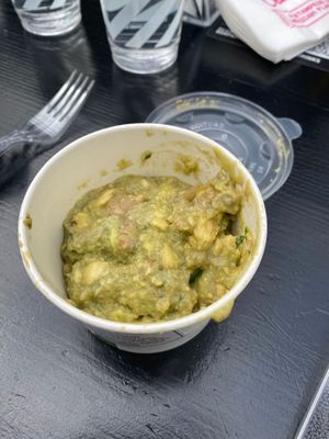 Guacamole (added it to our burritos and it came in a separate pot, and both portions were in the same pot) at Chilango in Croydon