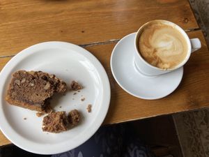 Coffee and walnut cake and soya flat white.  at Vennels Café in Durham