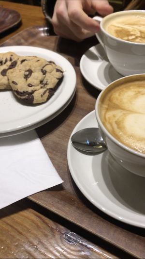 Soy milk latte and vegan cookies  at Vennels Café in Durham