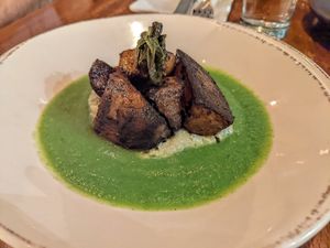Golden beets on a green sauce at Vedge in Philadelphia
