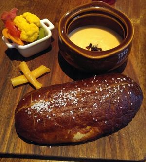 RUTABAGA FONDUE - today’s soft pretzel, yesterday’s pickle, charred onion at Vedge in Philadelphia