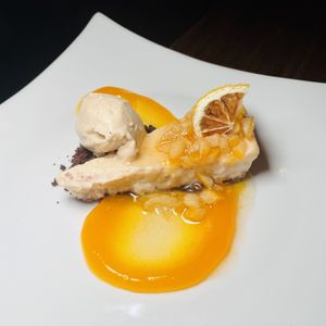 CITRUS CHEESECAKE. blood orange, lemon marmalade, tangerine ice cream  at Vedge in Philadelphia