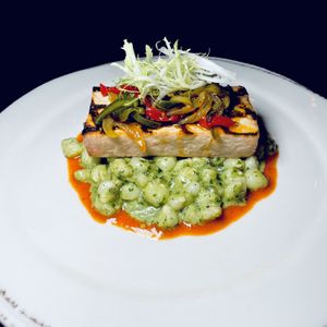 GRILLED TOFU with pepper rajas, hominy and poblano cream  at Vedge in Philadelphia