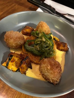 Hominy Fritters & Charred Delicata Squash with refried quinoa, aji amarillo and squash escabeche at Vedge in Philadelphia