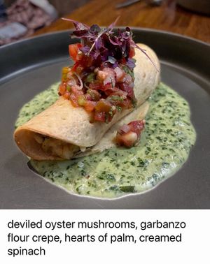 deviled oyster mushrooms, garbanzo flour crepe, hearts of palm, creamed spinach  at Vedge in Philadelphia