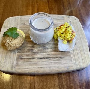amuse bouche sun-choke bisque, harmony fritter with Ahi amaretto, avocado chip with romesco & pickled cauliflower  at Vedge in Philadelphia