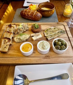 Fondue, pretzel roll, and charcuterie board amazing selections  at Vedge in Philadelphia