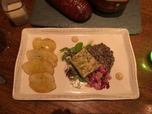Delicate thinly sliced tofu with black lentils  at Vedge in Philadelphia