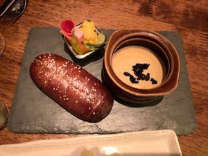 Rich and velvety rutabaga fondue with fresh pretzel and pickles  at Vedge in Philadelphia
