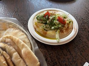 hummus plate served with grilled pita  at Mamouns Falafel in New Haven